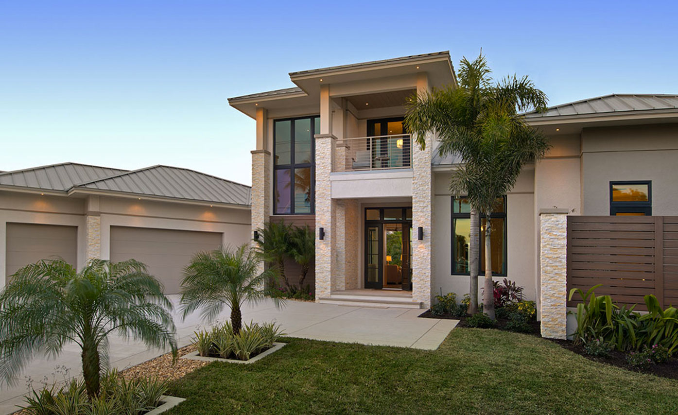 Mediterranean style stone facade on home in Naples Florida