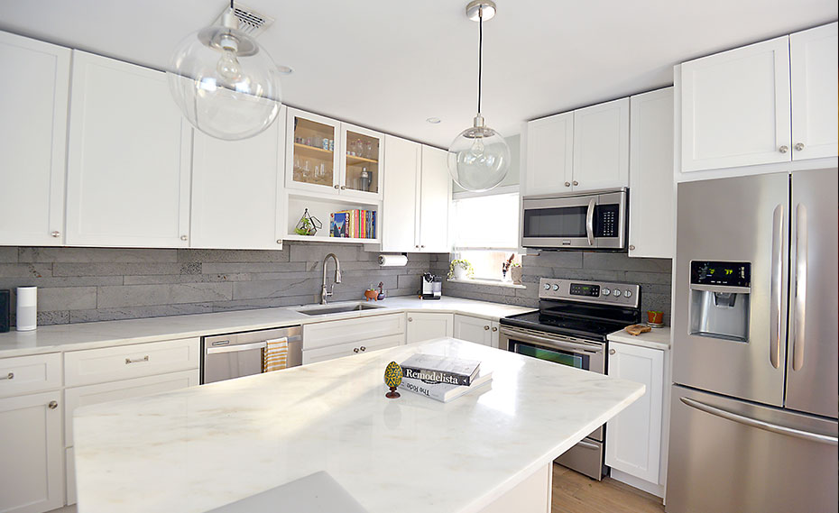 Large Stone Strips Used on Kitchen Backsplash under wood cabinets